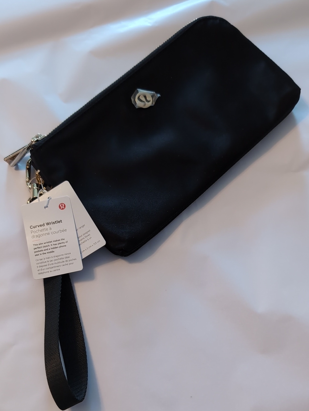 lululemon athletica White Curved Wristlet Tag Detail